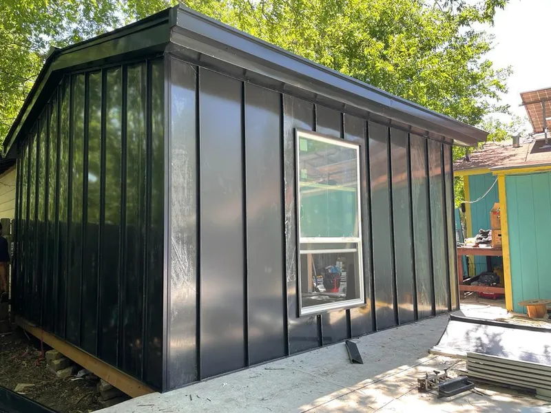 Black standing seam metal wall panels for Metal Roof Installation in Sand Springs