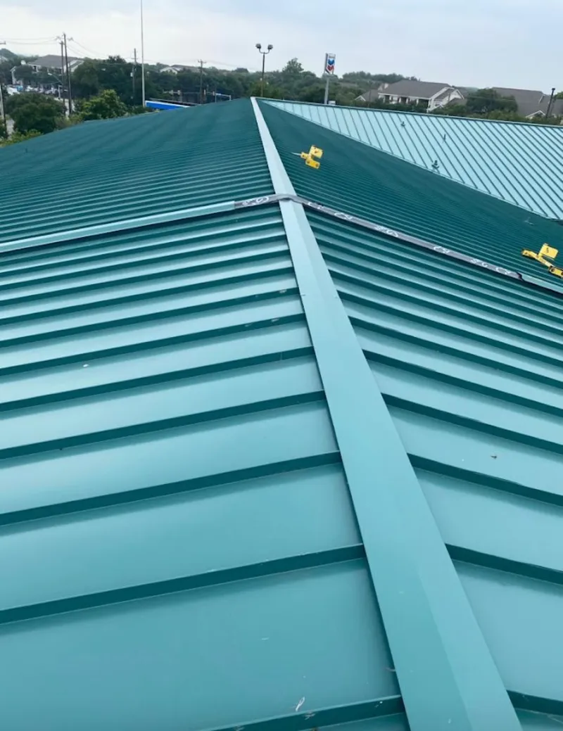 Green commercial metal roof ridge and valley for Metal Roof Repair in Sand Springs