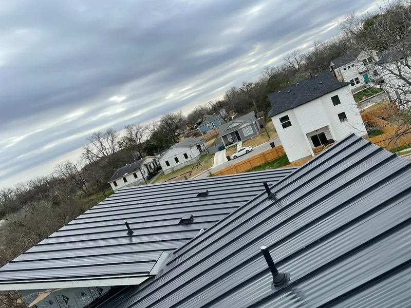Standing seam metal roof panels with vents for Skylight Repair in Sand Springs